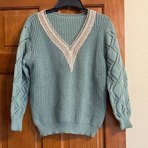 Elegant V-Neck Sweater size large. Never worn.